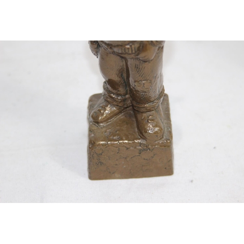 793 - COPPERISED FIGURE OF A CHILD DRESSED AS  COWBOY
23CM