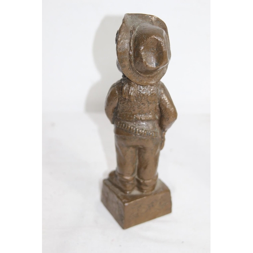 793 - COPPERISED FIGURE OF A CHILD DRESSED AS  COWBOY
23CM