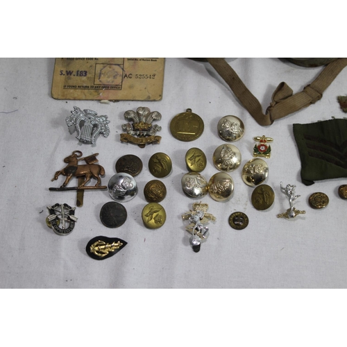 765 - QUANTITY OF MILITARY BADGES AND BUTTONS ETC