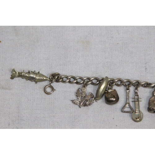 903 - VINTAGE SILVER CHARM BRACELET