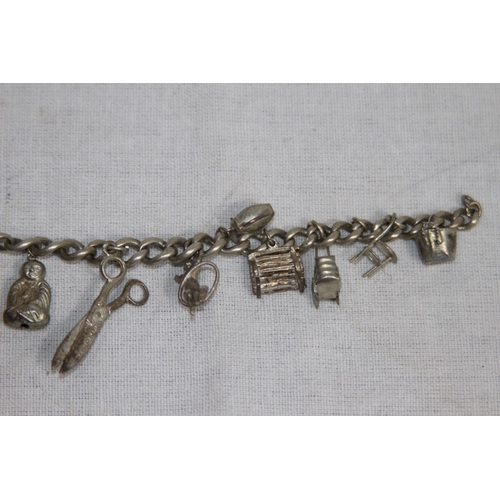 903 - VINTAGE SILVER CHARM BRACELET