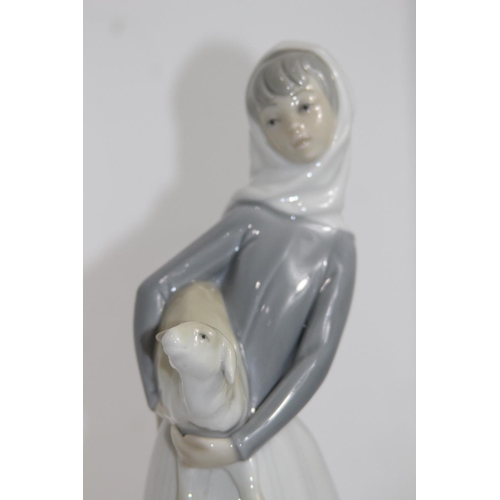 820 - LLADRO GIRL HOLDING A GOAT
27CM