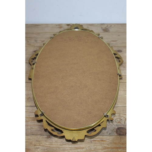 146 - VINTAGE OVAL ORNATE MIRROR
67 X 40CM