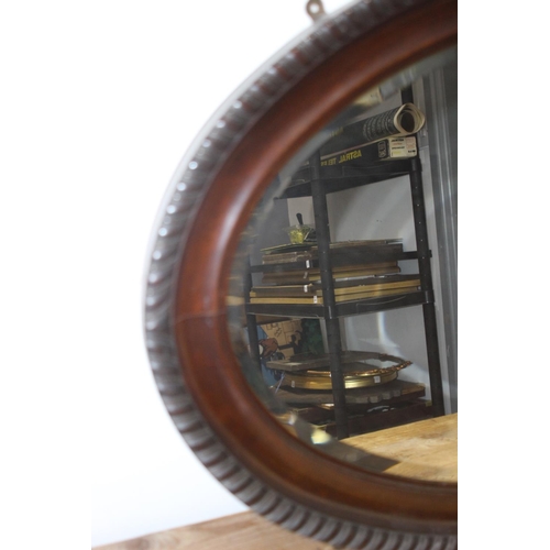 164 - ANTIQUE OVAL MIRROR
100 X 64CM