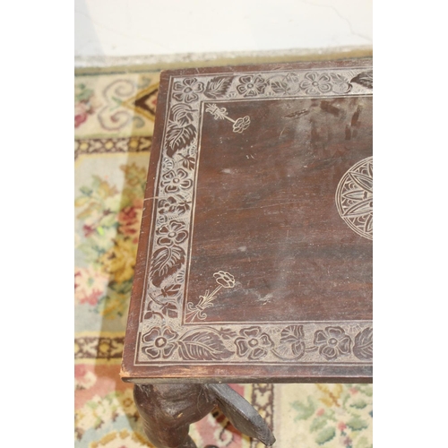 47 - CARVED WOODEN ELEPHANT HEAD LEGGED TABLE - A/F LEGS NEED REPAIR
44 X 44 X 60CM