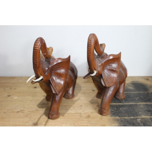 606 - 2 X WOODEN ELEPHANTS 
50 X 42CM