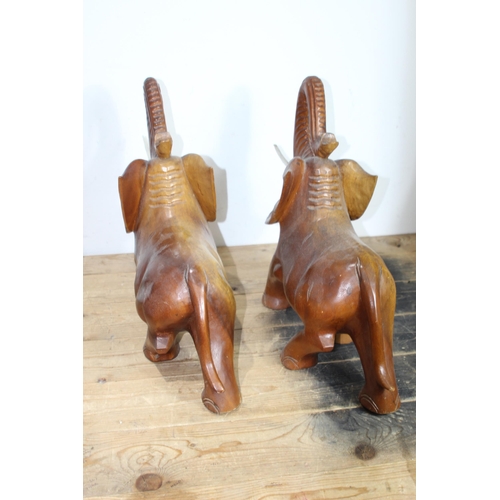 606 - 2 X WOODEN ELEPHANTS 
50 X 42CM