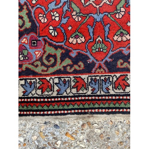 121 - VINTAGE EASTERN RUG
110 X 85CM