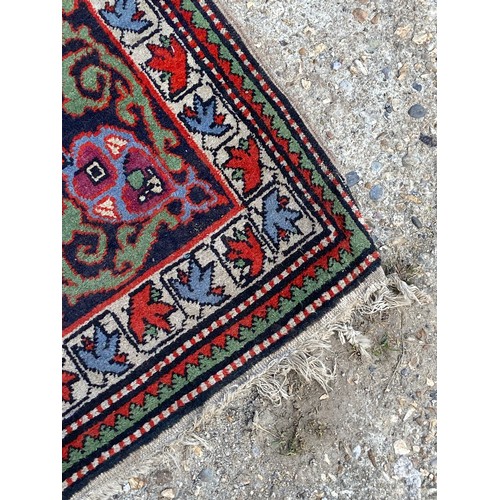 121 - VINTAGE EASTERN RUG
110 X 85CM