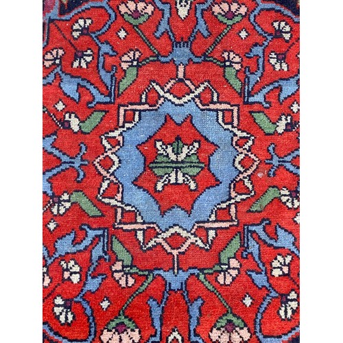 121 - VINTAGE EASTERN RUG
110 X 85CM