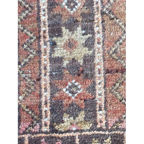 122 - VINTAGE EASTERN RUG
122 X 83CM