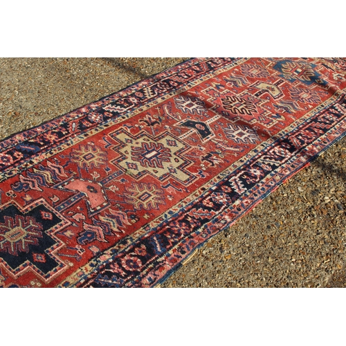 113 - LARGE GEOMETRIC PERSIAN RUNNER RUG
450 X 90CM