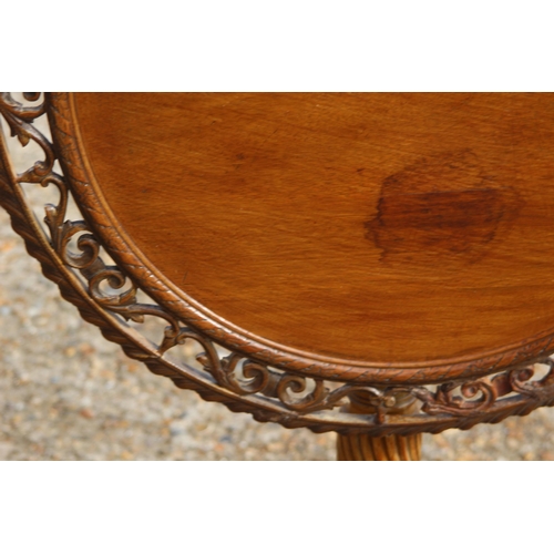 95 - ETHNIC CARVED TILT TOP TABLE ON TRIPOD FEET
70 X 70CM