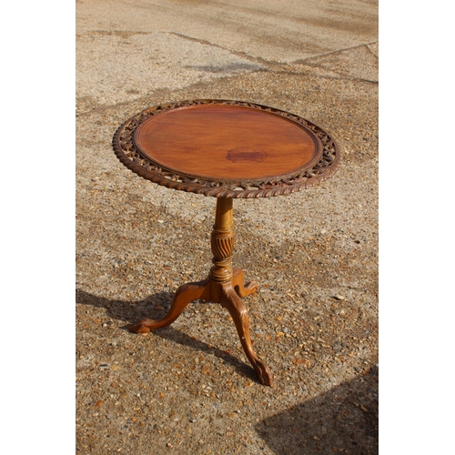 95 - ETHNIC CARVED TILT TOP TABLE ON TRIPOD FEET
70 X 70CM