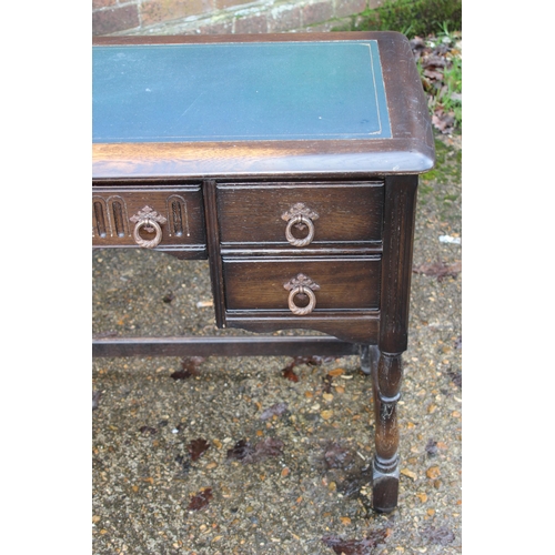 25 - VINTAGE LEATHER TOPPED DESK
104 X 46 X 72CM