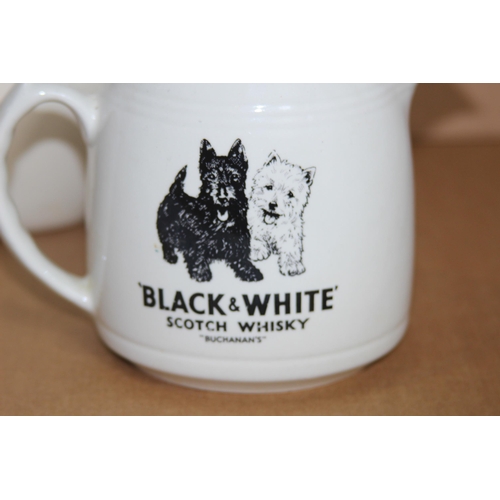 218 - VINTAGE BLACK AND WHITE WHISKEY JUG AND TWO OTHERS