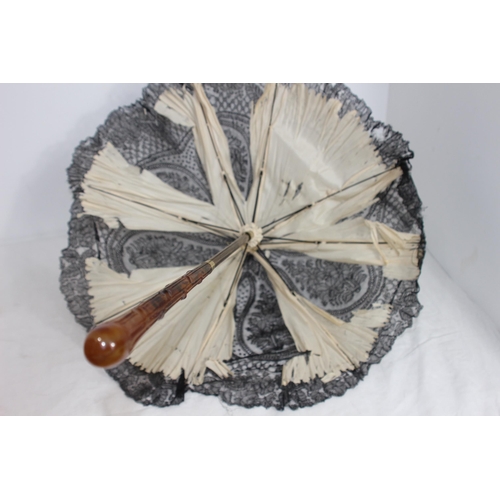 314 - ANTIQUE LADIES PARASOL WITH BAKELITE HANDLE 
48CM