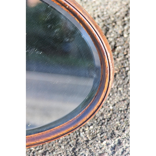 164 - VINTAGE OVAL MIRROR 
72 X 44CM