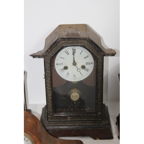 353 - QUANTITY OF VINTAGE CLOCKS 
34CM