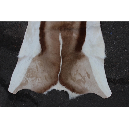 93 - 2 X ANIMAL HIDE RUGS 
220 X 208CM