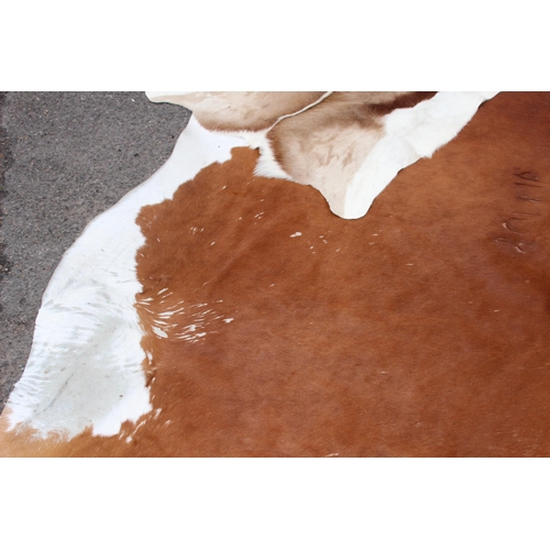 93 - 2 X ANIMAL HIDE RUGS 
220 X 208CM