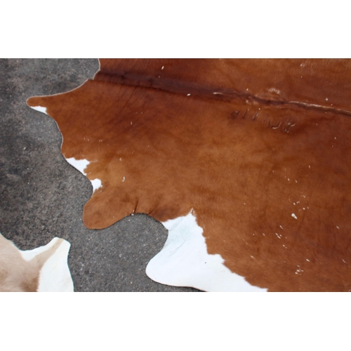 93 - 2 X ANIMAL HIDE RUGS 
220 X 208CM