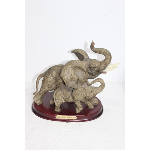 292 - THE JULIANA COLLECTION AND THE CROSA COLLECTION ELEPHANT FIGURES ON PLINTHS 
37 X 33CM