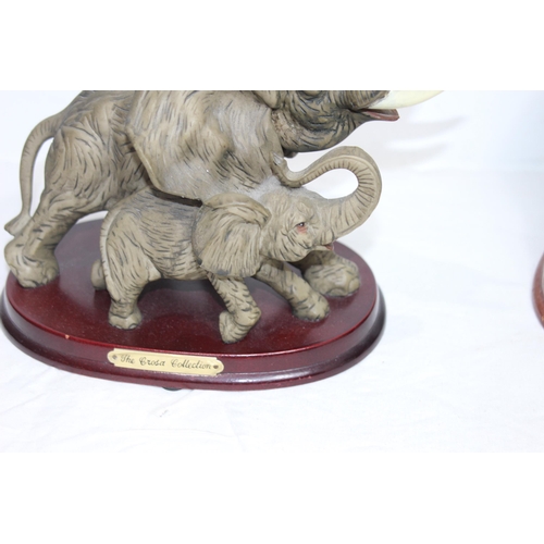 292 - THE JULIANA COLLECTION AND THE CROSA COLLECTION ELEPHANT FIGURES ON PLINTHS 
37 X 33CM