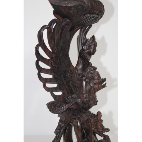 384 - EASTERN DEITY WOODEN CARVING