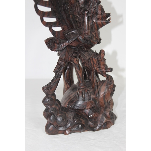 384 - EASTERN DEITY WOODEN CARVING