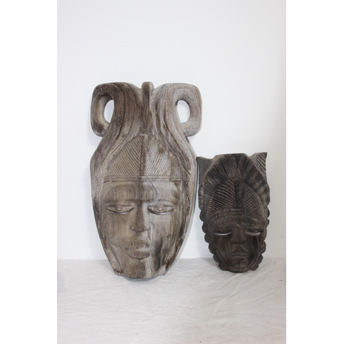 396 - QUANTITY OF VINTAGE HANDCARVED MASKS 
37CM