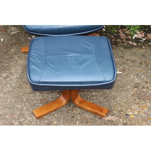 52 - LEATHER ARMCHAIR AND FOOTSTOOL