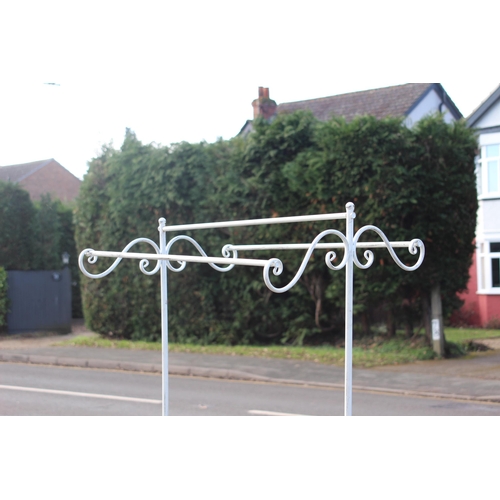 59 - DECORATIVE CLOTHES RAIL - HAS A WOBBLE 
173 X 75CM