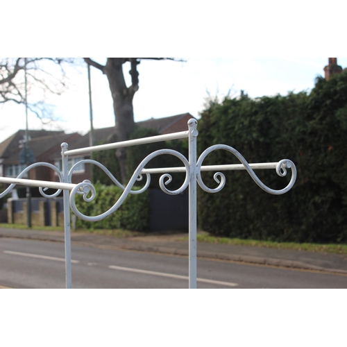 59 - DECORATIVE CLOTHES RAIL - HAS A WOBBLE 
173 X 75CM