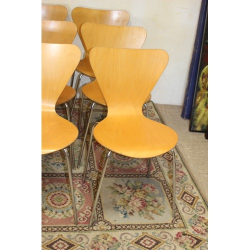 62 - SET OF FOUR STYLE CHAIRS