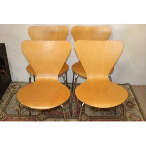 62 - SET OF FOUR STYLE CHAIRS