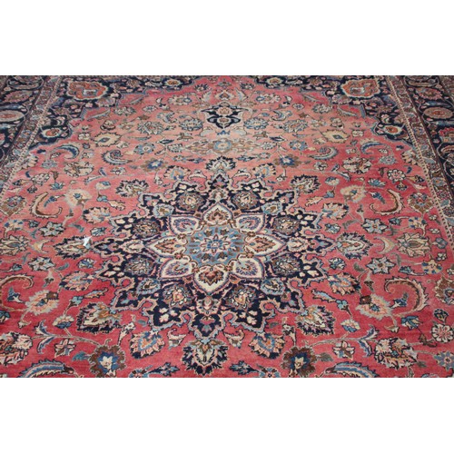 96 - LARGE ANTIQUE EASTERN RUG
310 X 230CM