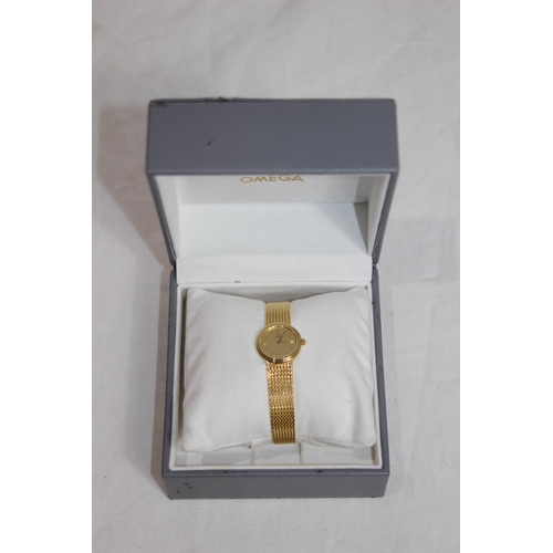 879 - VINTAGE LADIES OMEGA 18K GOLD WATCH BOXED