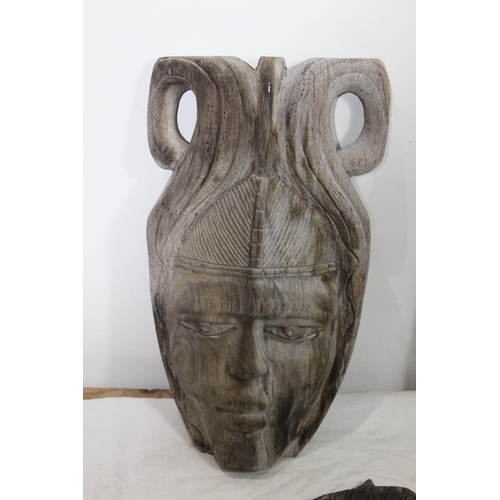 396 - QUANTITY OF VINTAGE HANDCARVED MASKS 
37CM