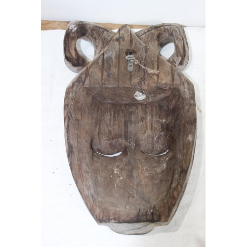 396 - QUANTITY OF VINTAGE HANDCARVED MASKS 
37CM