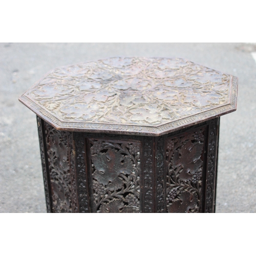 17 - ANTIQUE CARVED ANGLO INDIAN FOLDING OCTAGONAL TABLE 
57 X 53CM