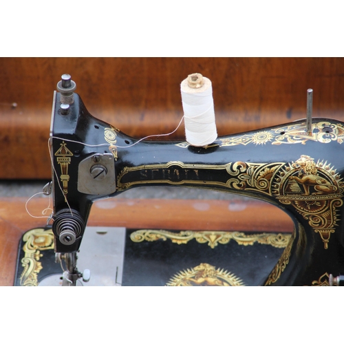 249 - VINTAGE SEWING MACHINE