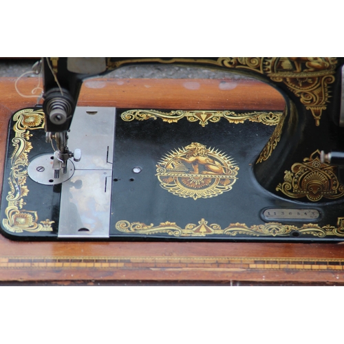 249 - VINTAGE SEWING MACHINE