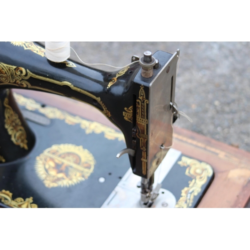 249 - VINTAGE SEWING MACHINE