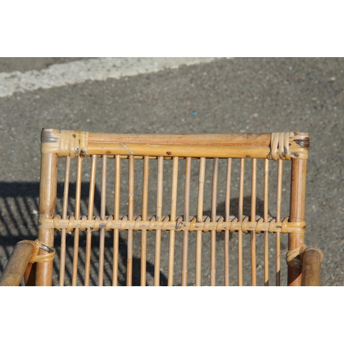 44 - VINTAGE CHILDS BAMBOO AND WICKER ROCKING CHAIR 
39 X 70 X 50CM