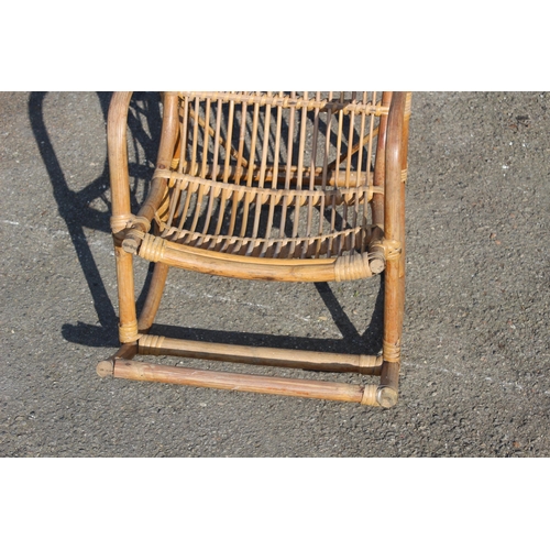 44 - VINTAGE CHILDS BAMBOO AND WICKER ROCKING CHAIR 
39 X 70 X 50CM