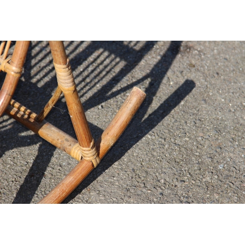 44 - VINTAGE CHILDS BAMBOO AND WICKER ROCKING CHAIR 
39 X 70 X 50CM