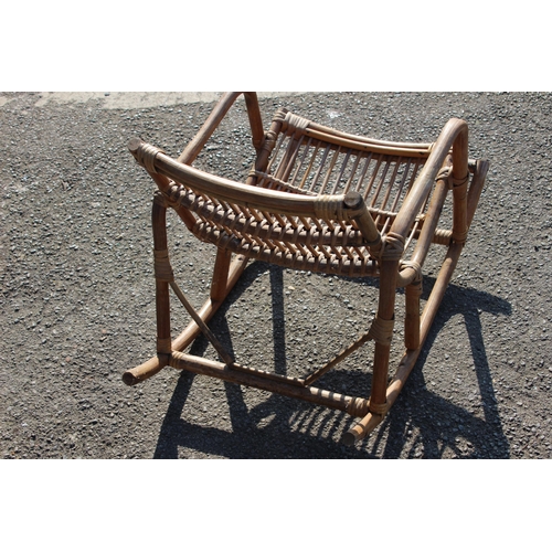 44 - VINTAGE CHILDS BAMBOO AND WICKER ROCKING CHAIR 
39 X 70 X 50CM