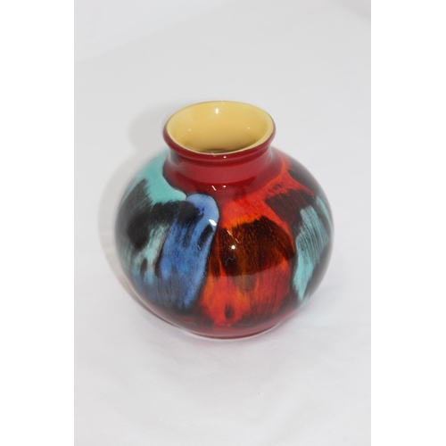 562 - POOLE POTTERY VOLCANO BULB VASE
10CM