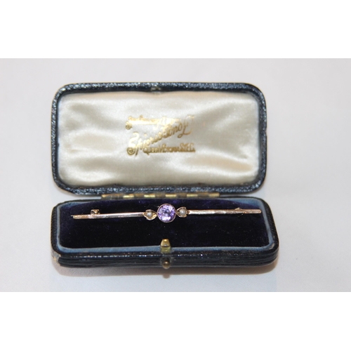 788 - CASED 9CT GOLD AMETHYST AND SEED PEARL BROOCH